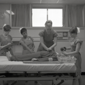 2016_107_018a Nurses practicing bag respiration and external cardiac massage, 1968