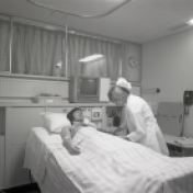 2016_107_036b ICU nurse and patient, 1973