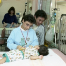Transferring patients from the old PICU to the new PICU on the first official day of unit operations, 14 December 1988.