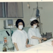 Nurses with patient in ICU, 1969