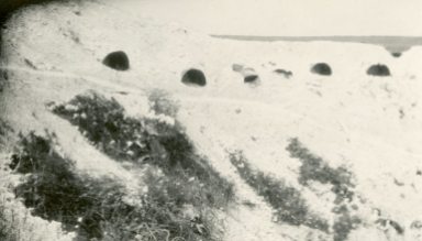 Dugouts in a shell hole at Vimy, France