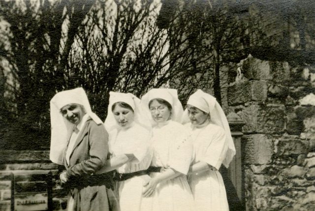[Left to right:] Mrs. King Brown, Miss Hudson, Miss Merion, A.J. [Alfreda Jenness] Attrill. Buxton, May 1918, England.