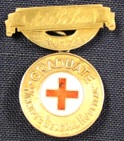Winnipeg General Hospital School of Nursing graduation pin belonging to Ada Law, 1903.