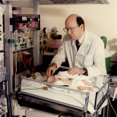 Dr. Henrique Rigatto with baby Kyle Grant in Neonatal Respiratory Control Lab, 1992. HSC Archives/Museum F3_Pn014_074
